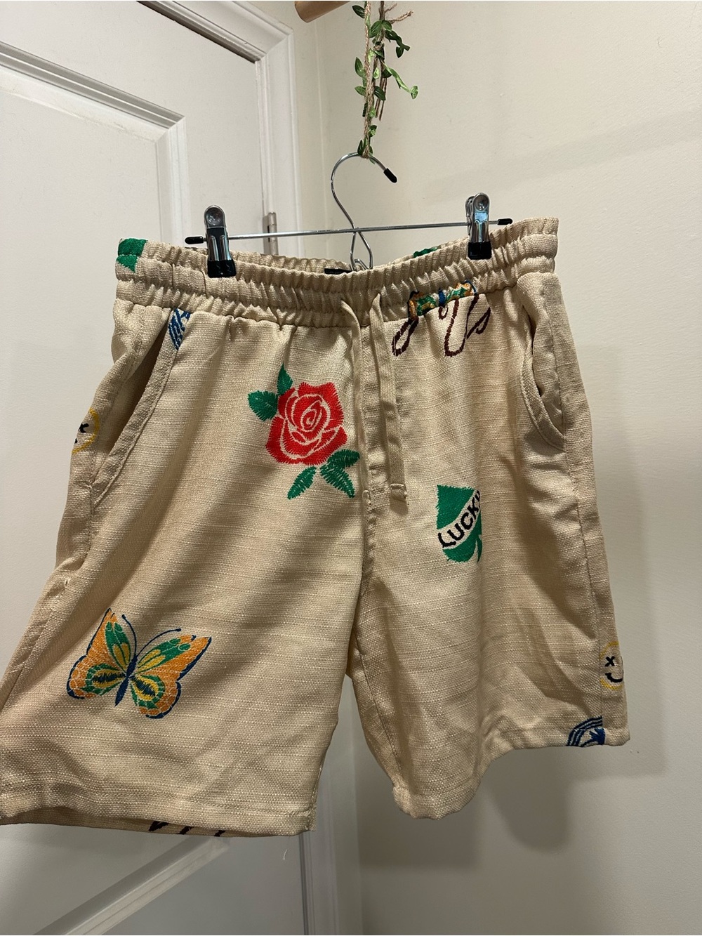 Men's Beige Embroidered Floral & Butterfly Flat Front Shorts